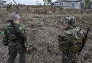 В братских могилах под Донецком обнаружены тела 40 мирных жителей - Похоронный портал