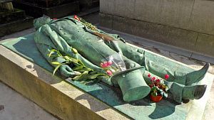 The grave of Victor Noir, nom de plume for journalist Yvan Salmon. Little known in life, in death he has become a fertility icon, his nether regions regularly rubbed by women seeking a happy love life. Ulrike Lemmin-Woolfrey